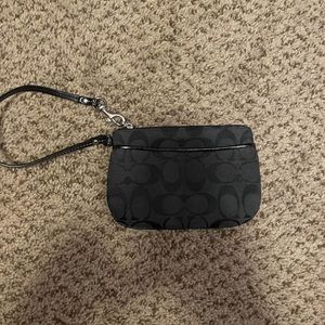Black Coach Wristlet. Rarely used, excellent condition. Smoke free home.